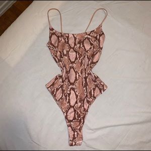 Snake print bodysuit.